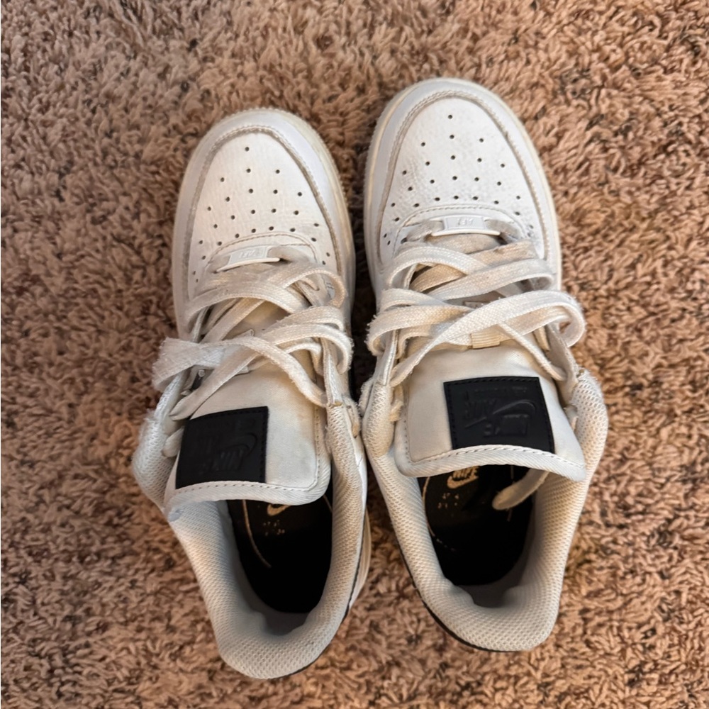White Air Force Jordan’s with black outline